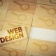 wooden block web design and magnifying glass