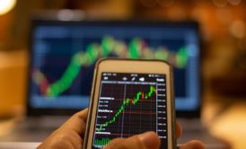 forex trading on smartphone and computer