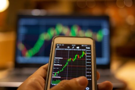 forex trading on smartphone and computer