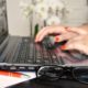 woman typing on windows 10 laptop