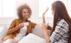 two women talking to each other