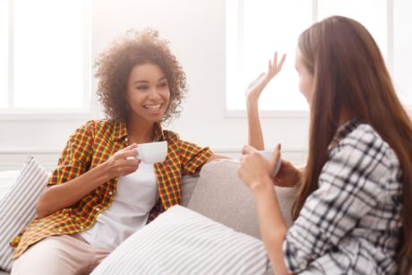 two women talking to each other