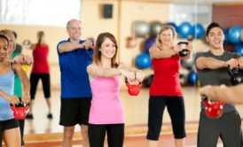 people working out with kettlebell
