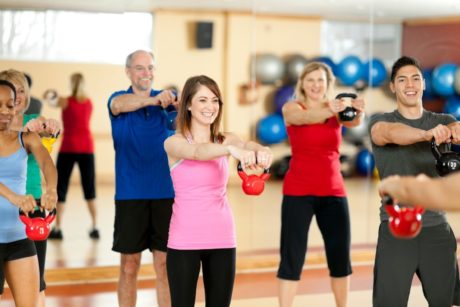 people working out with kettlebell