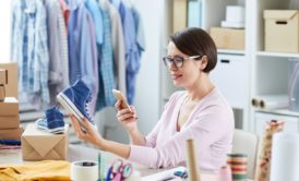 woman taking photo of product