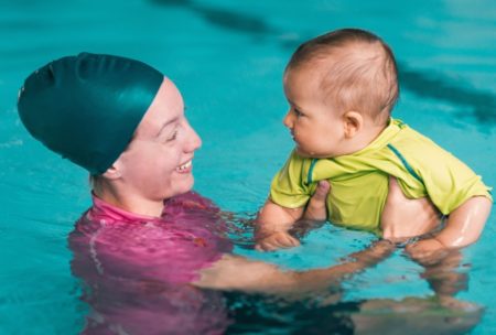 mom baby having swim lessons