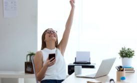 happy woman raising hand