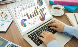 man using excel data analysis tools on silver laptop