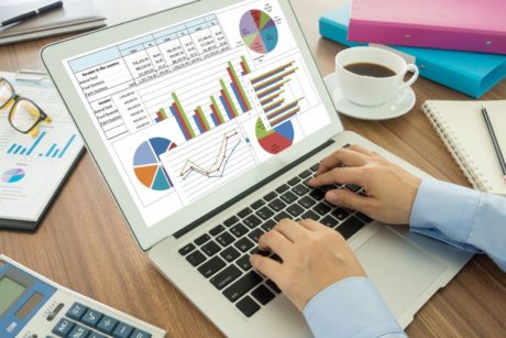 man using excel data analysis tools on silver laptop