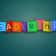 cut outs forming the word leadership