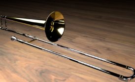 trombone on wooden floor