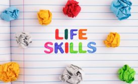 life skills notebook and crumpled colored paper