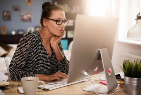 woman designing with microsoft publisher 365