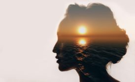 woman head sunset