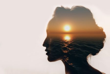 woman head sunset