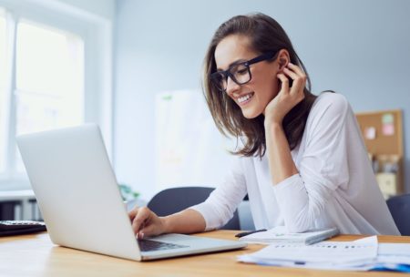 woman white laptop