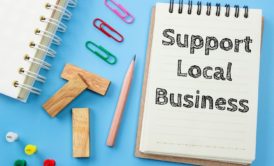 support local business notepad paper clips and pencil