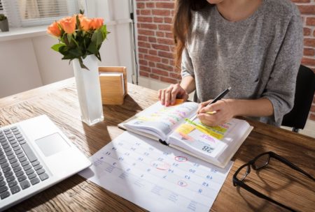female remote worker planning schedule
