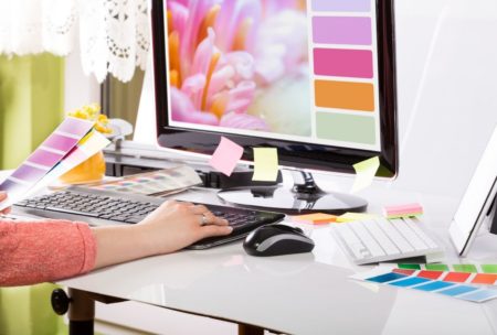 designer using adobe illustrator