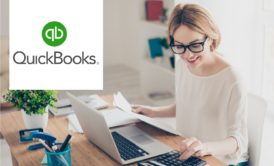 quickbooks logo and woman typing on silver laptop