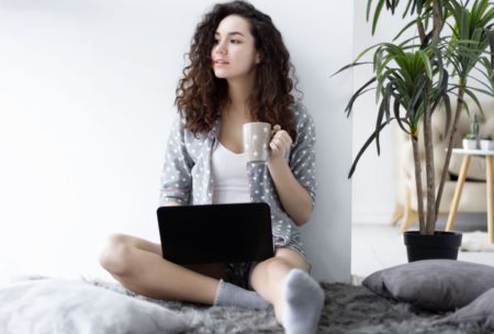 female freelancer with black laptop