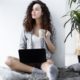 female freelancer with black laptop