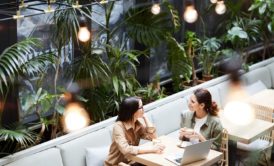 two women talking about business