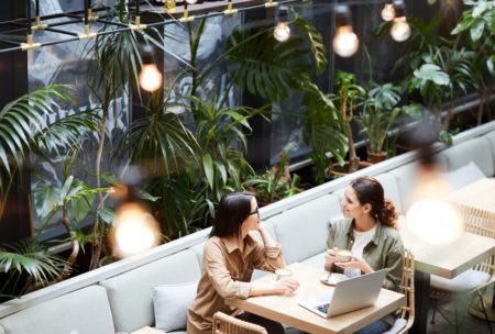 two women talking about business