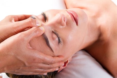 woman getting acupressure massage therapy