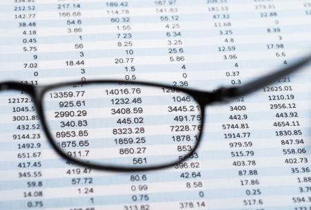 a pair of glasses on an excel sheet