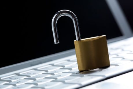 metal lock on top of laptop