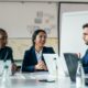 three colleagues having a workplace meeting