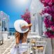 woman sitting at an outdoor cafe in greece