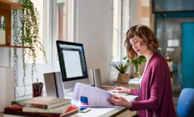 home-based businesswoman working on desk