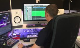 music producer working in a modern studio