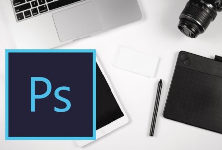 photoshop logo silver laptop ipad and camera on white desk
