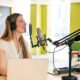 woman recording a podcast in studio