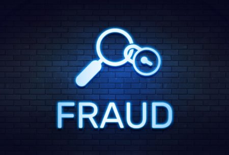 magnifying glass with lock and the word fraud