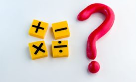 mathematical symbols beside a big red question mark