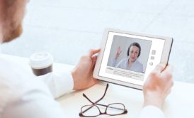 two persons talking over video chat through mobile phone