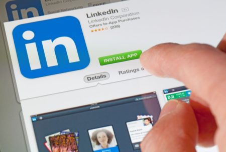 person downloading the linkedin app from the playstore