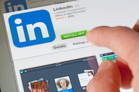 person downloading the linkedin app from the playstore