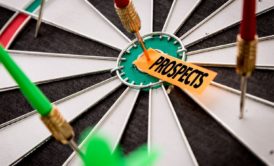 dart board with the word prospects in the middle