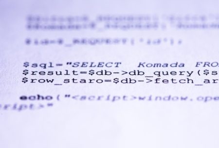 close up of PHP codes for a cryptocurrency website on a white screen