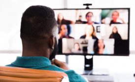 Man having a virtual team meeting