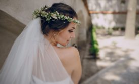 bride wearing flowers in her hair