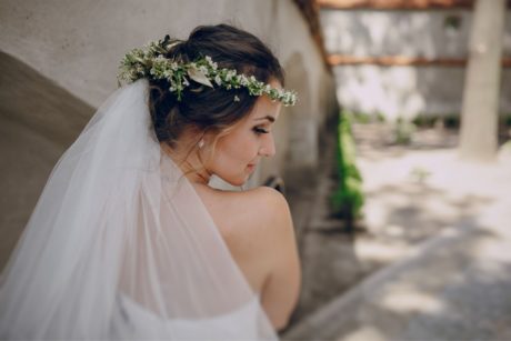 bride wearing flowers in her hair