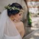 bride wearing flowers in her hair