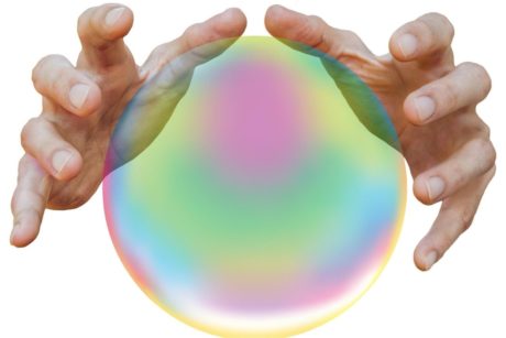 male hands on a crystal ball