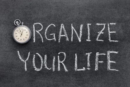 organize your life written in white chalk